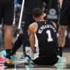 Victor Wembanyama leaves Spurs-76ers game with left rib contusion after hurting shoulder